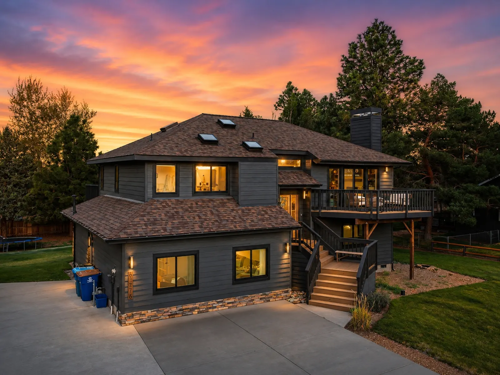 Modern home addition with sunset backdrop by Almog Construction in Central Oregon.